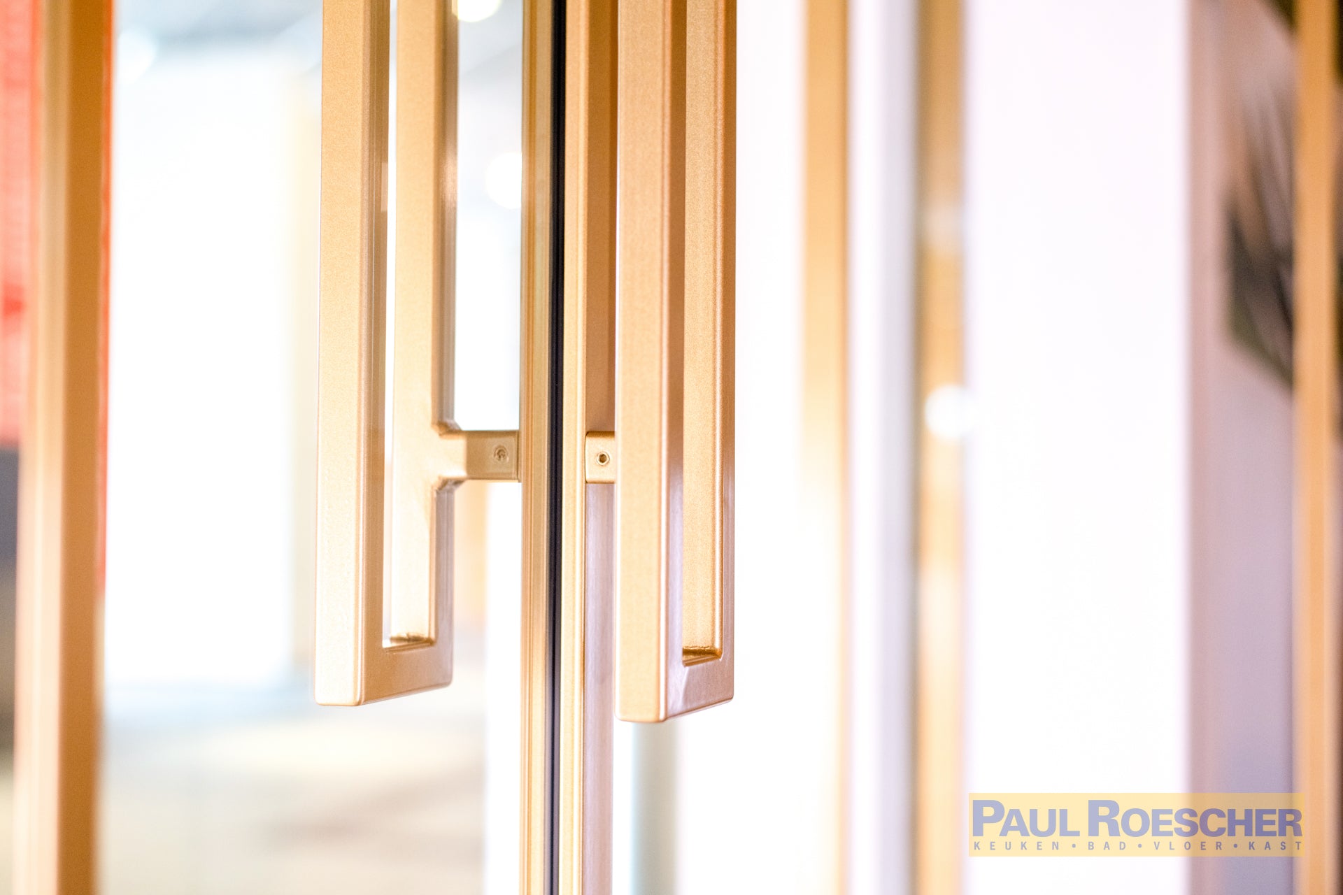 Luxe glazen deur met gouden frame